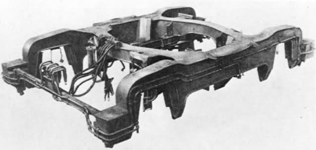 Le châssis du bogie à nu, laisse apparaitre sa forme en "H" avec les deux traverses médianes.